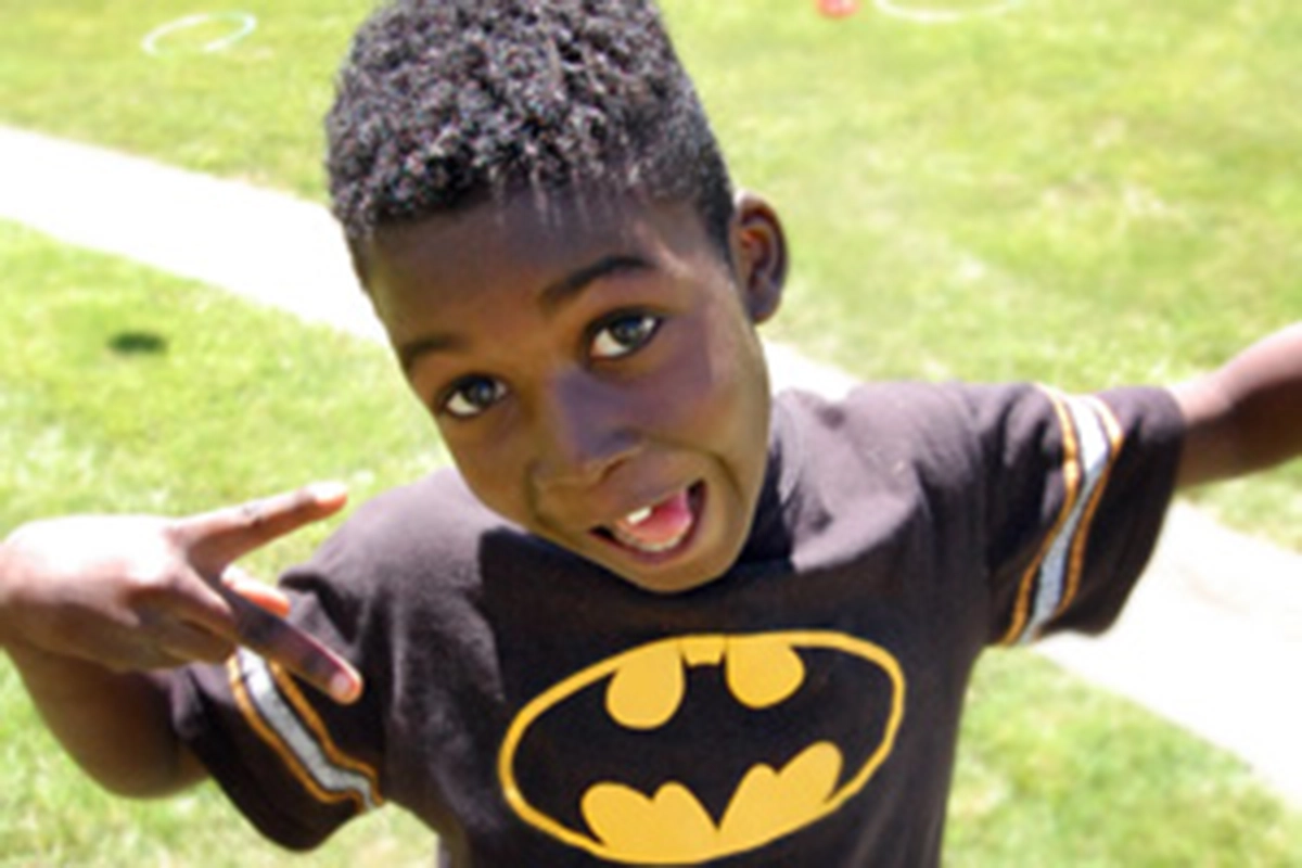 Child smiling on a playground