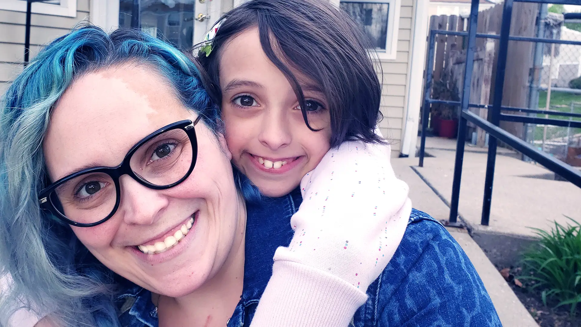 A Phoenix Family staff member working one-on-one with a community resident