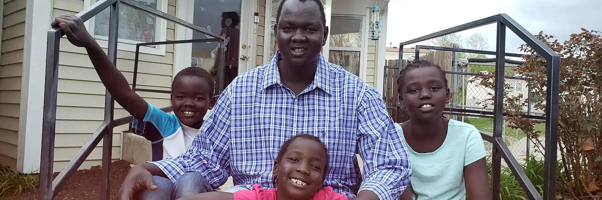 A family sharing time together in their apartment community