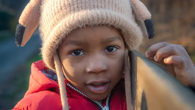 Child during Christmas supported by Adopt a Family program