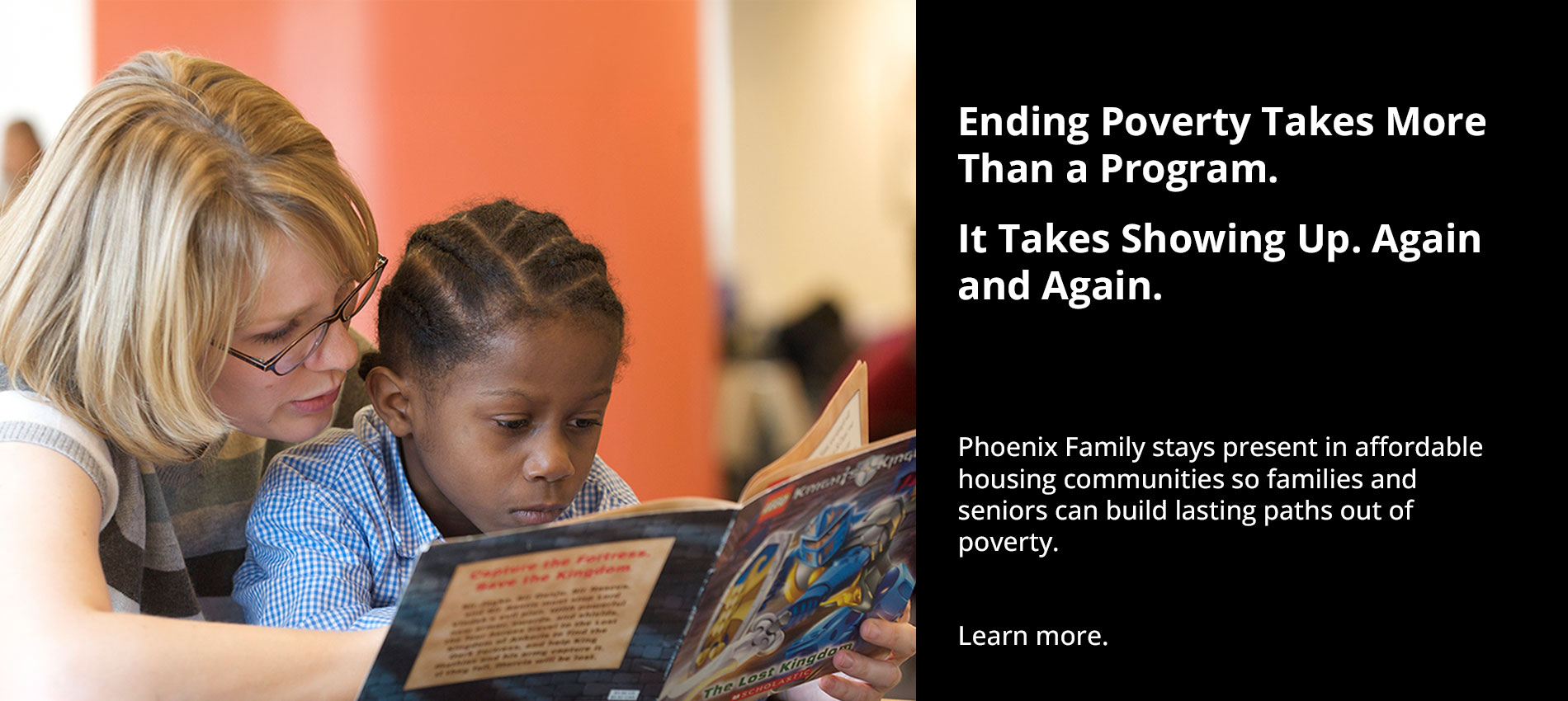 A reading coach sitting beside a child, reading together at a table.
